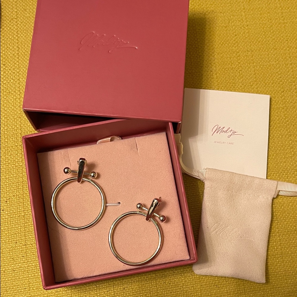 Gold Hoop Earrings by Mejuri